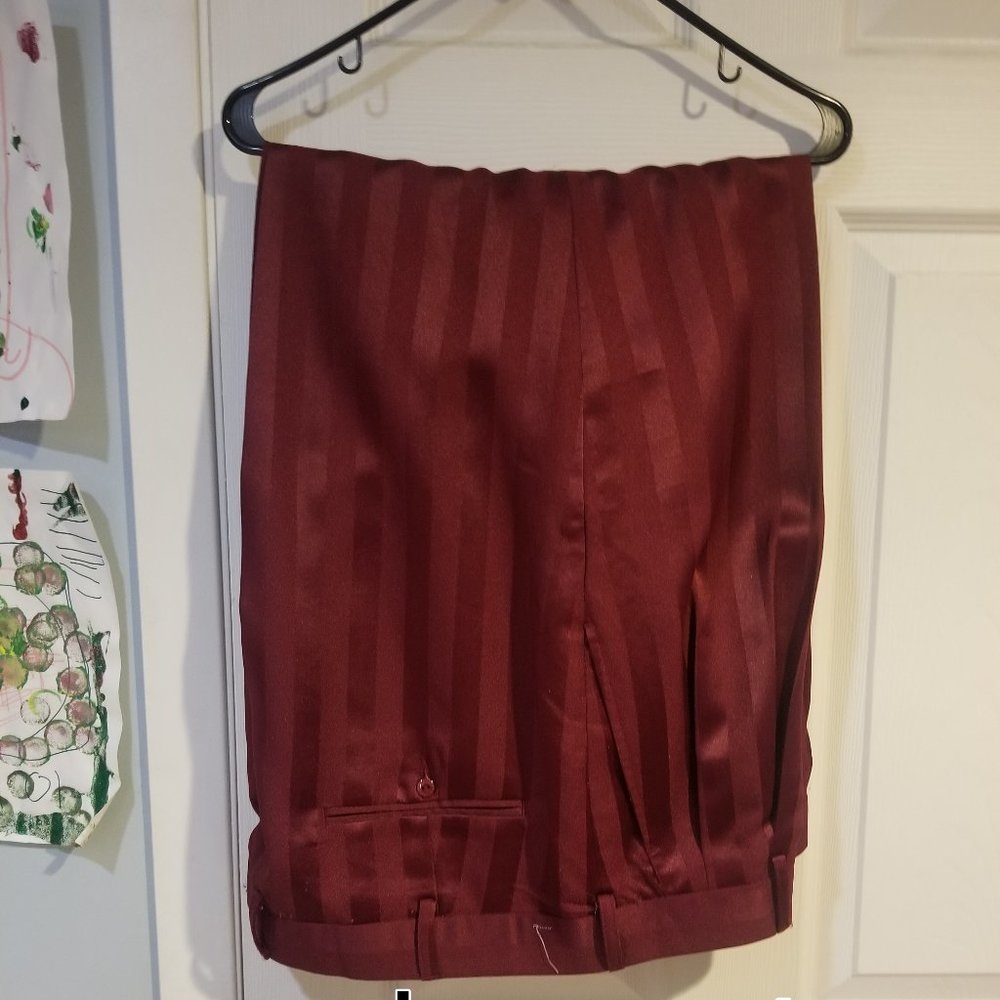 Men's Dress Pants size 42. Hemmed at 30 cuff can be removed to extend